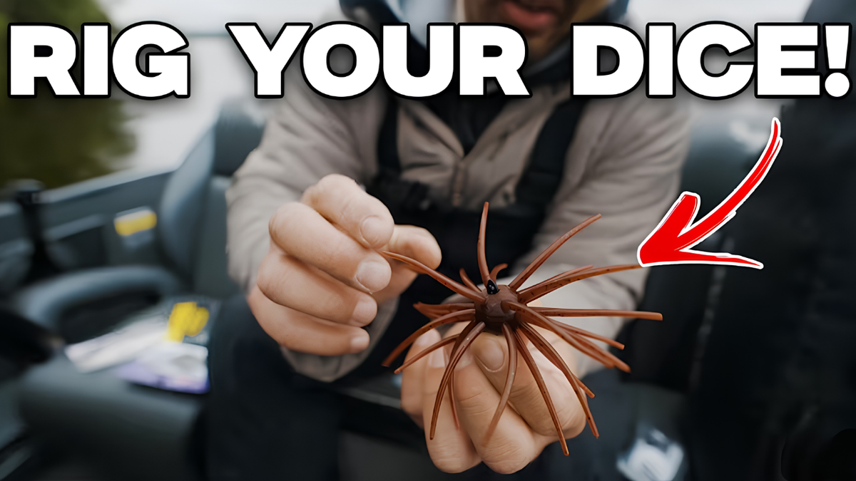 hands grasping brown red urchin bass lure