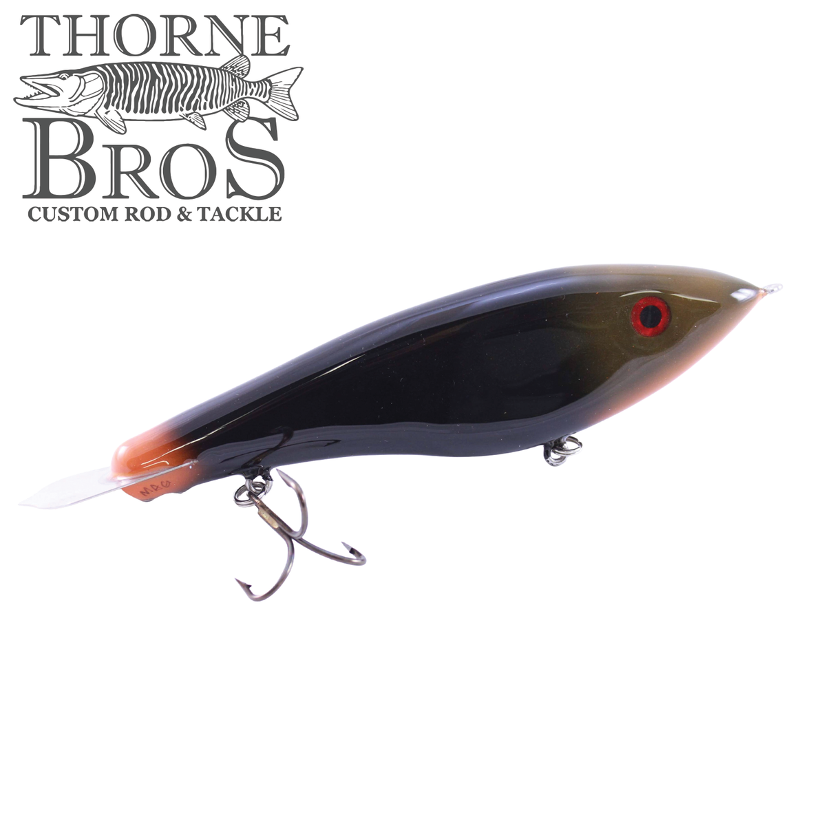 Bitten Warlock - MAG. musky fishing lure in black and orange with red eye clear diving lip and treble hooks from Thorne Bros