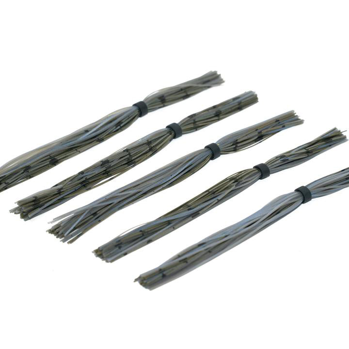 Five bundles of 6th Sense Silicone Skirt strands in translucent gray with dark stripes, used as fishing tackle skirts for lures.