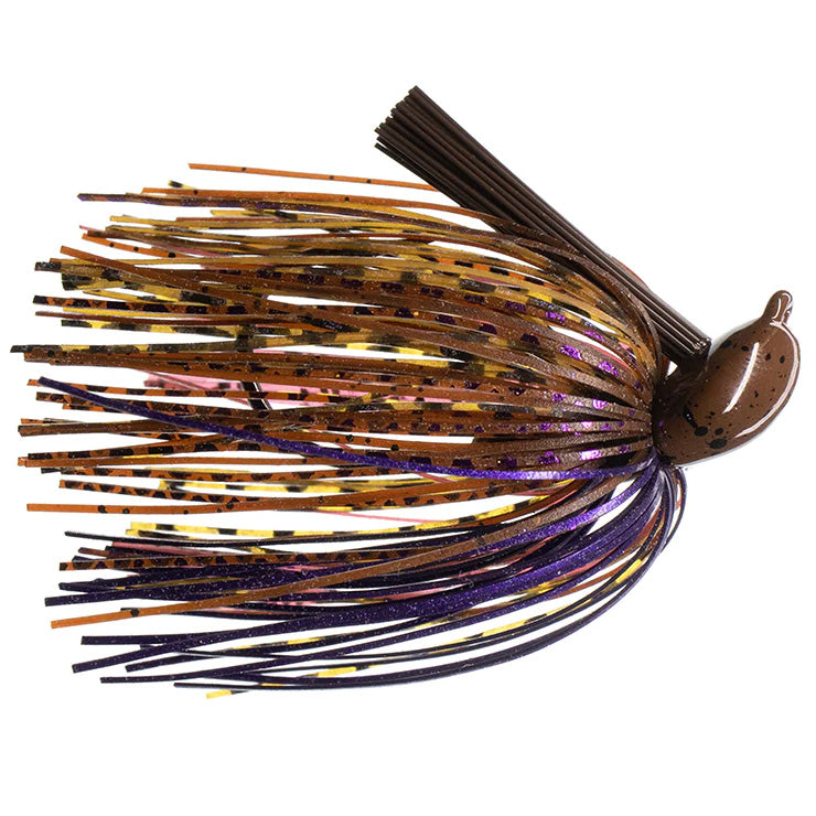 Dirty Jigs Tour Level Pitchin' Jig featuring a detailed head with a weed guard and multi-colored silicone skirt in shades of brown, gold, purple, and black designed for fishing tackle.