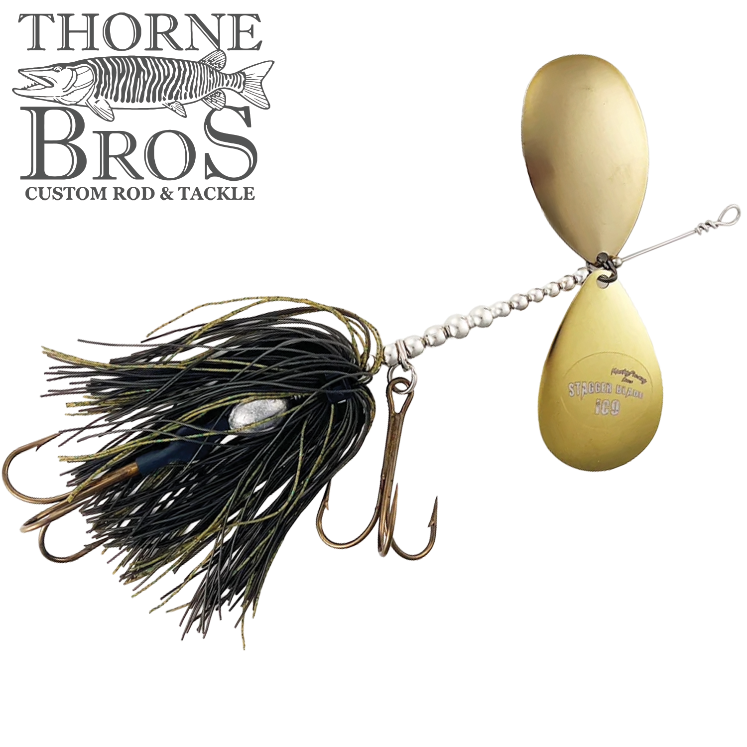 Musky Frenzy Apache Stag IC9 fishing lure with gold-colored spinner blades and black-and-green skirt featuring multiple fishing hooks, designed for musky fishing.