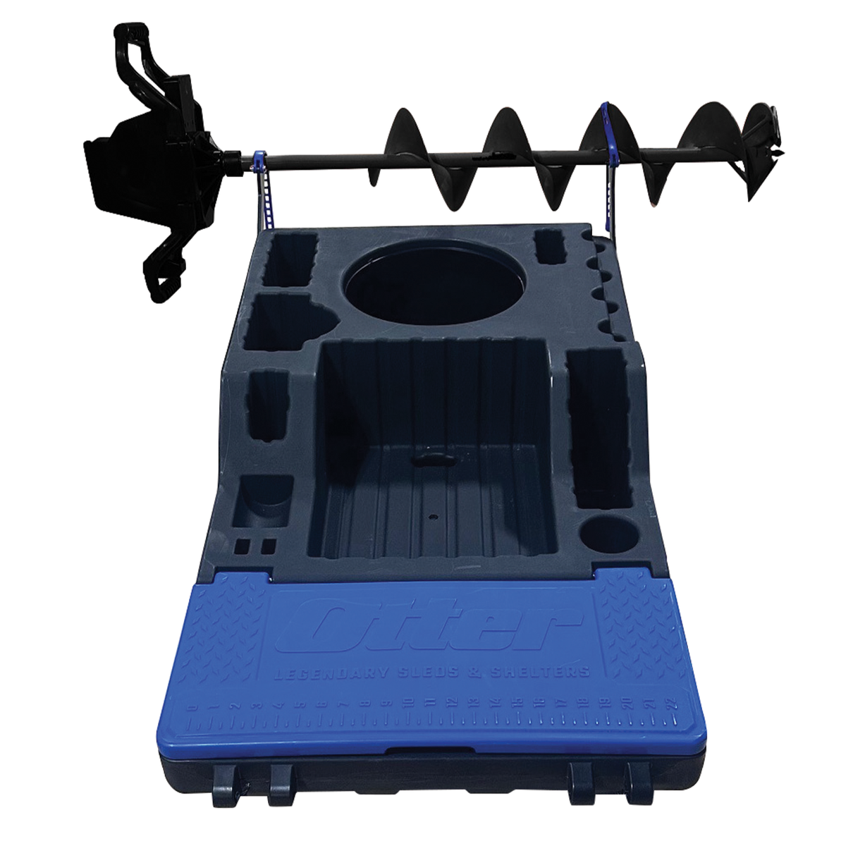 Otter Sonar Sled Auger Rack designed to hold and transport an ice auger securely on a durable sled with multiple compartments for fishing tackle organization.