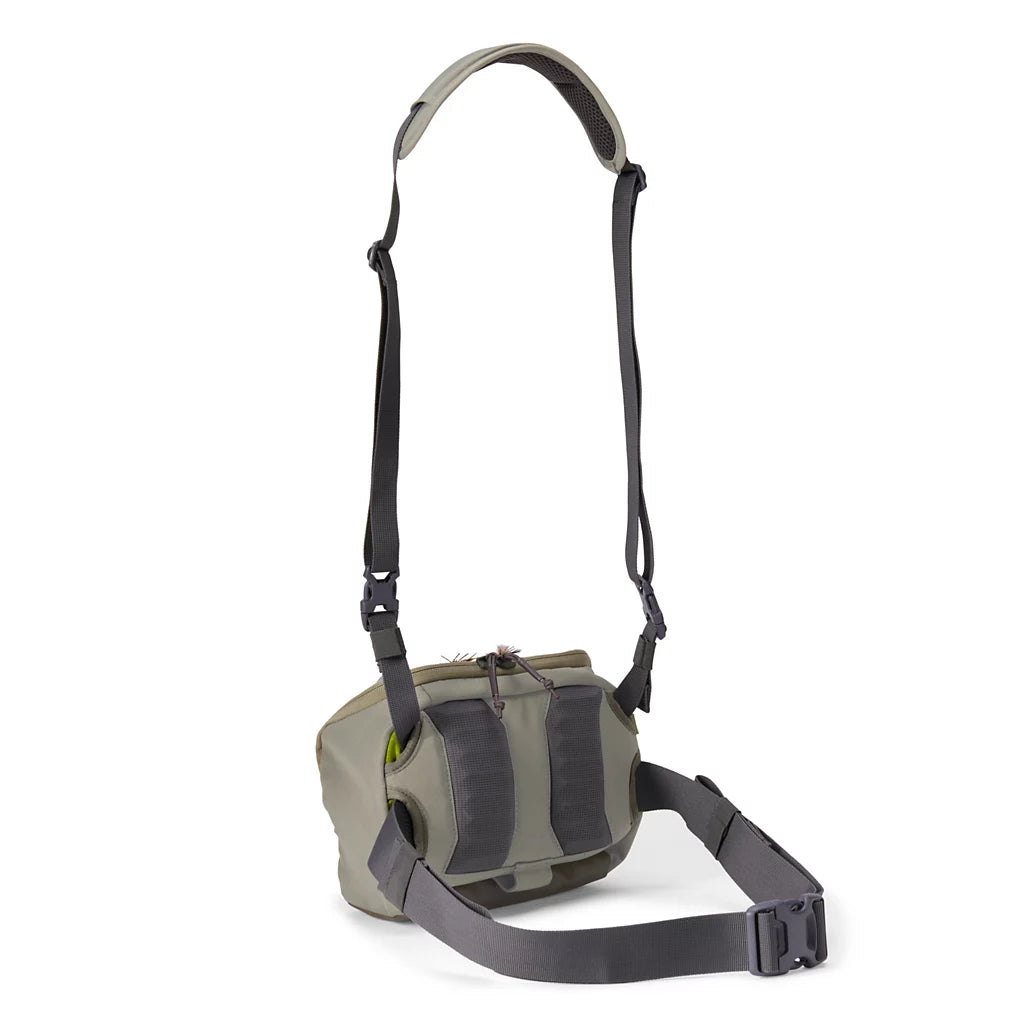 Orvis Chest/Hip Pack in olive green with adjustable shoulder strap waist belt and multiple storage compartments for fishing tackle