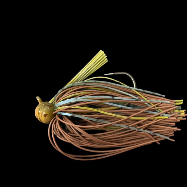 Greenfish Tackle Crawball Living Rubber Football Jig fishing lure with multi-colored silicone skirt and yellow weed guard designed for musky fishing tackle.