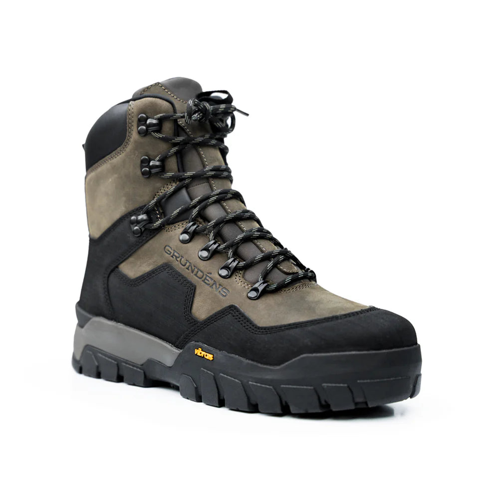 Grundens Bankside Wading Boot - Vibram Sole featuring durable brown and black construction, secure lacing, padded ankle support, and a rugged Vibram outsole for enhanced traction in wet fishing environments.