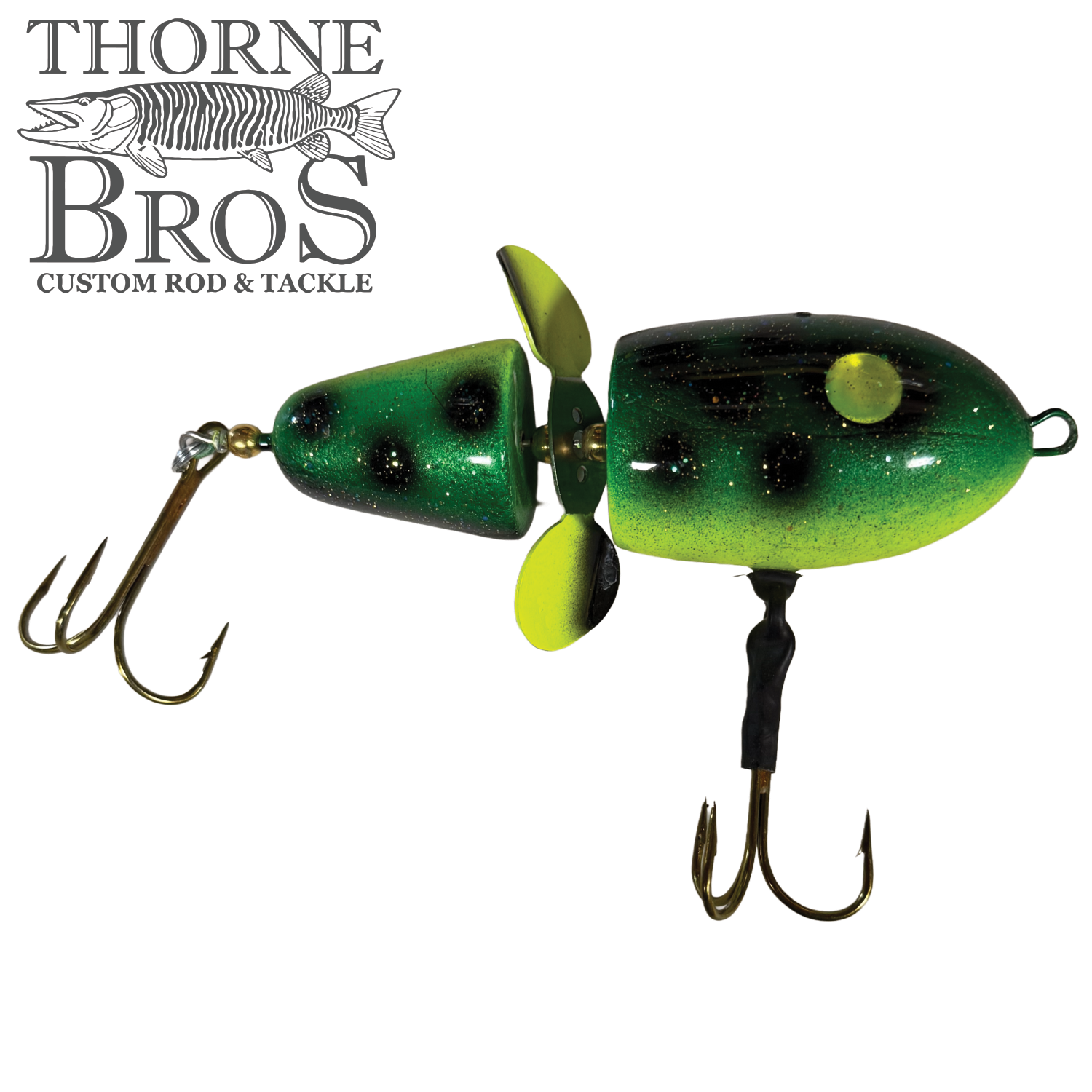 Green and black segmented fishing lure with two treble hooks and a yellow propeller, designed for musky fishing, shown alongside the Thorne Bros logo, featuring the Lake-X Hammer.