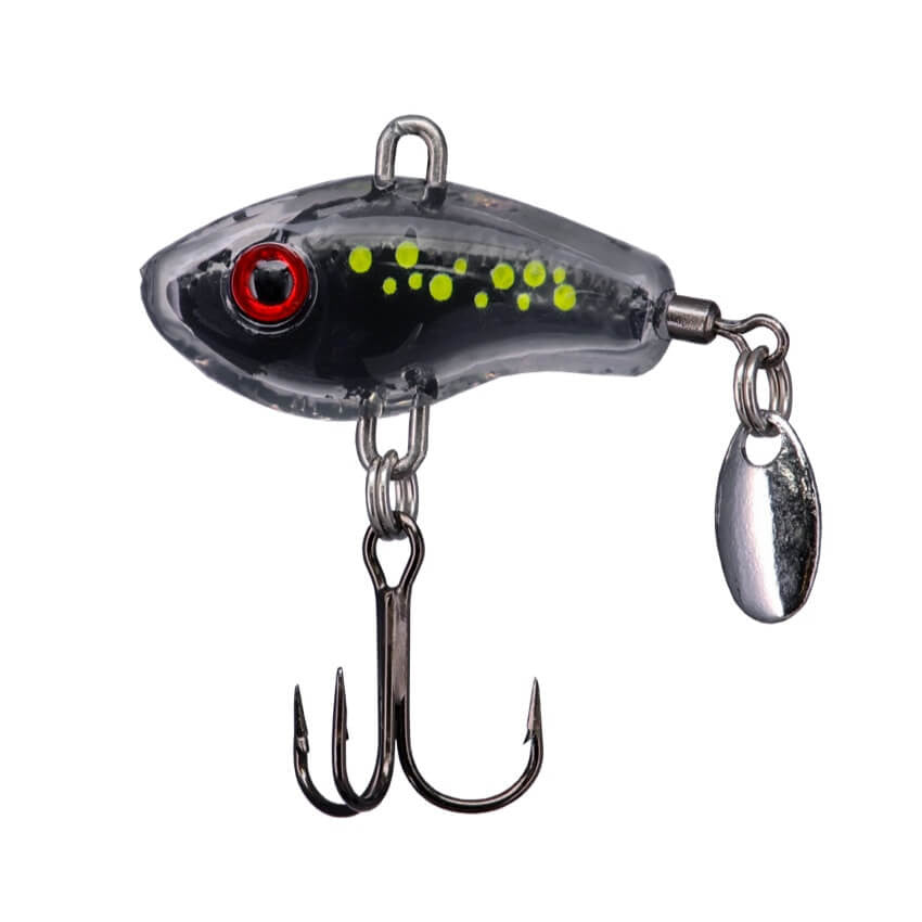 Close-up of a Northland Forage Fleck fishing lure with a black and transparent body, red eye, yellow specks, treble hooks, and a small silver spinner blade for attracting fish.