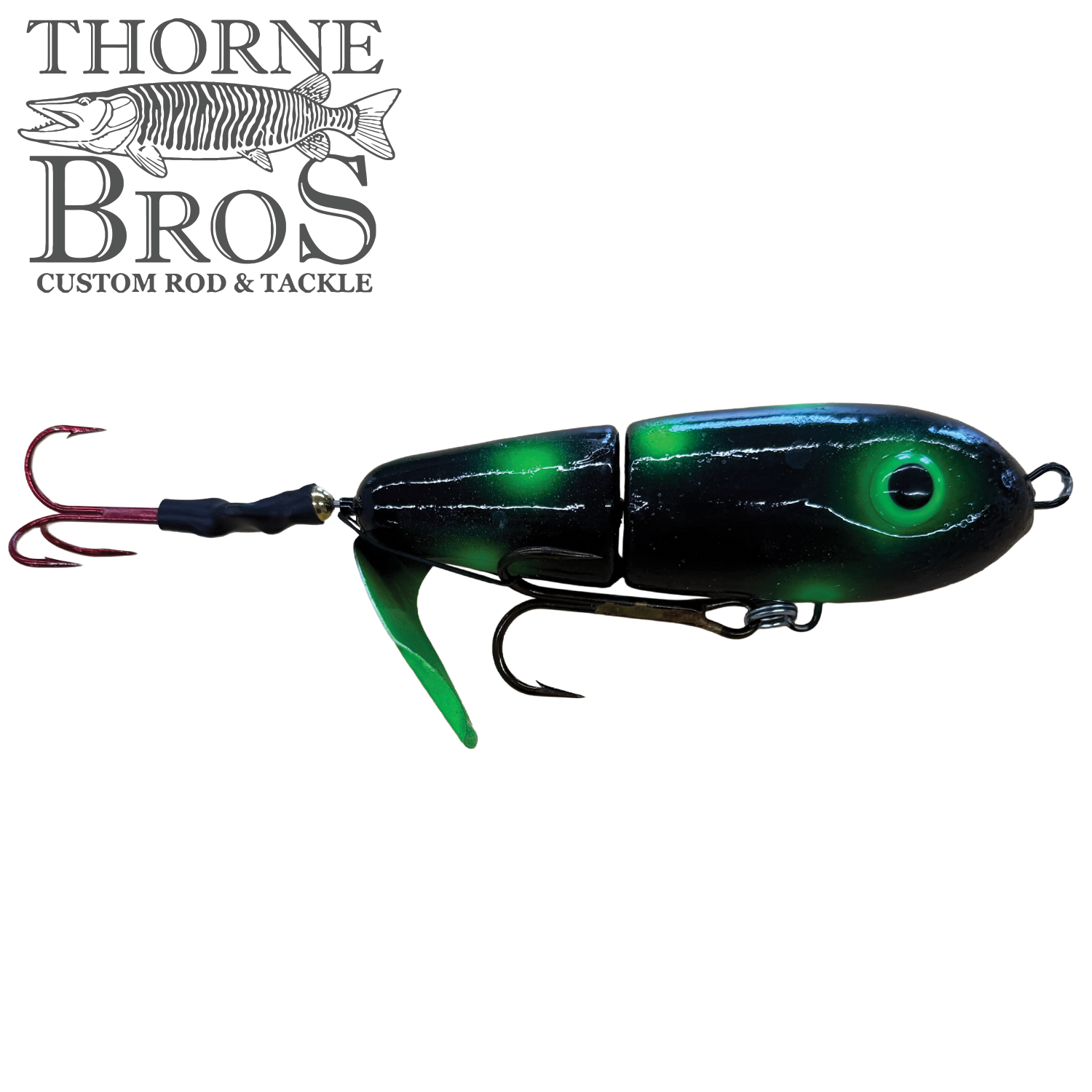 Lake-X Dr. Evil fishing lure with green and black segmented body, detailed eye design, and sharp treble hooks, designed for musky fishing tackle.