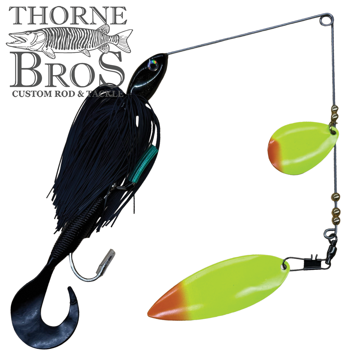 Ace Baits Monster Spinnerbait featuring a black silicone skirt and bright chartreuse orange tipped blades for musky fishing tackle