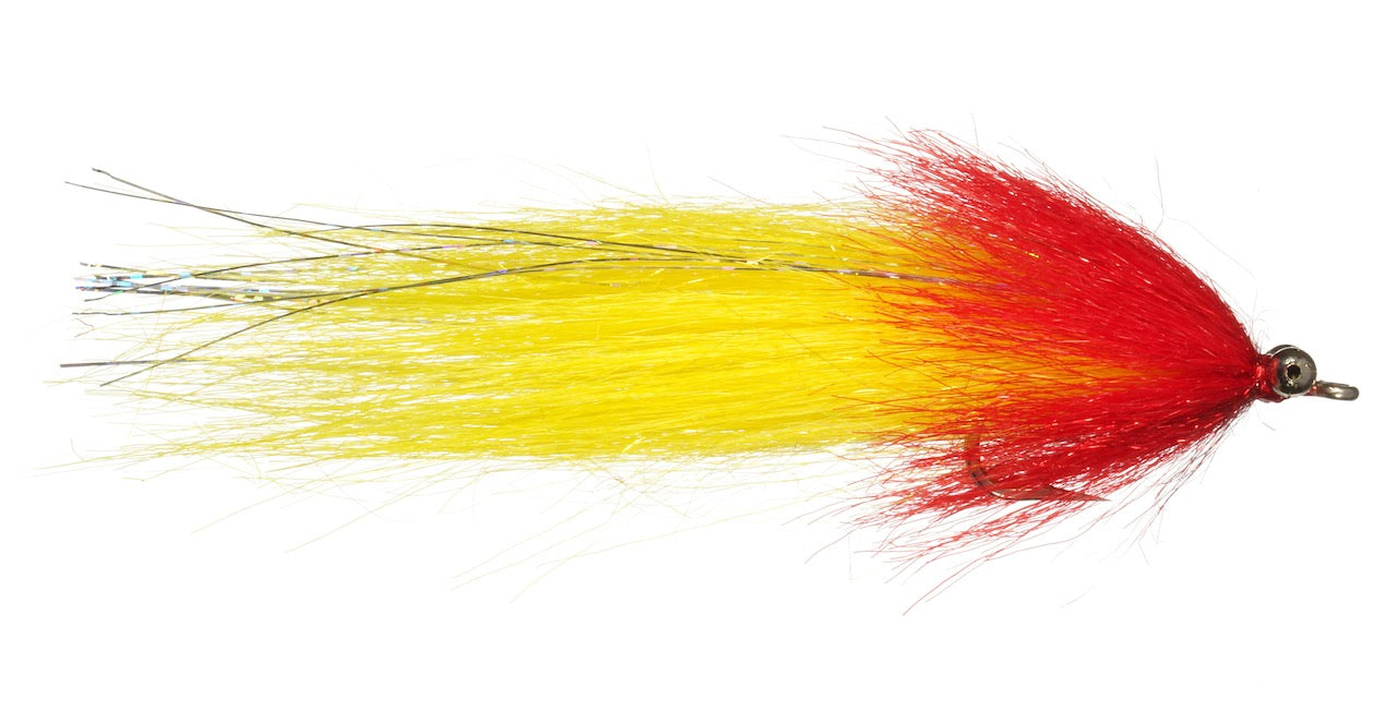 Craft Fur Whistler #2/0 fishing lure with a bright red and yellow fur body designed for musky fishing, featuring a detailed head and shimmering fiber tail for realistic water movement.