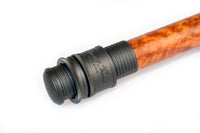 Close-up of the handle section of a Thomas & Thomas Avantt II Fly Rod featuring a wooden finish with detailed black reel seat components, ideal for fishing tackle enthusiasts.