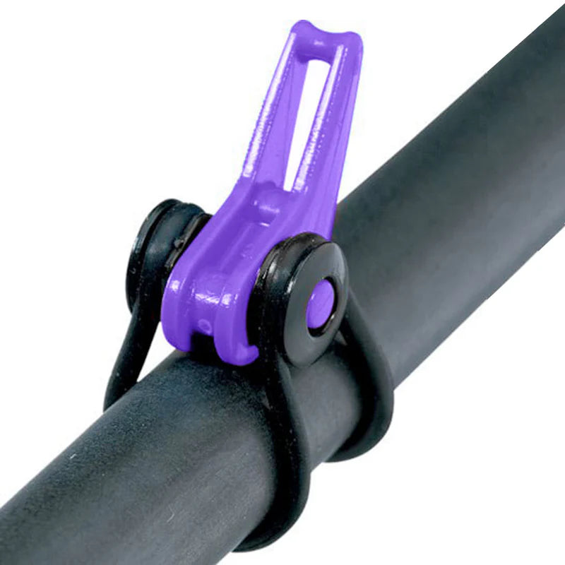 Close-up of a purple Fuji EZ Keeper rod holder securely attached to a black fishing rod, designed for organizing fishing tackle and accessories.