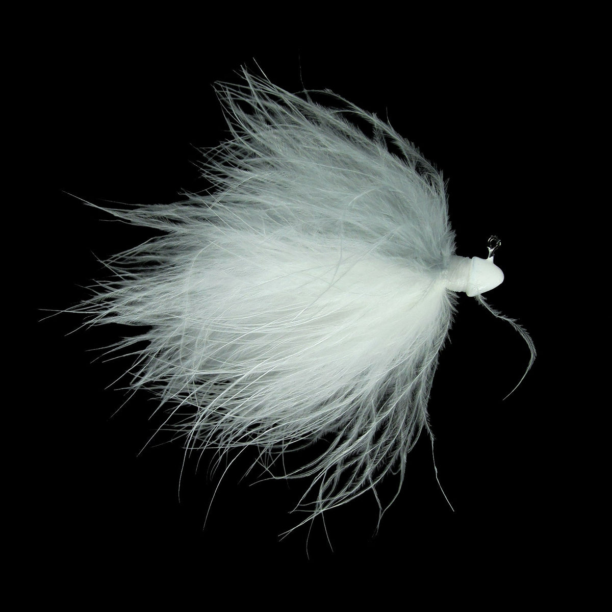 White feathered fishing lure with marabou material and a weighted head designed for casting, identified as Outkast Tackle Fighter Fly Marabou Jig.