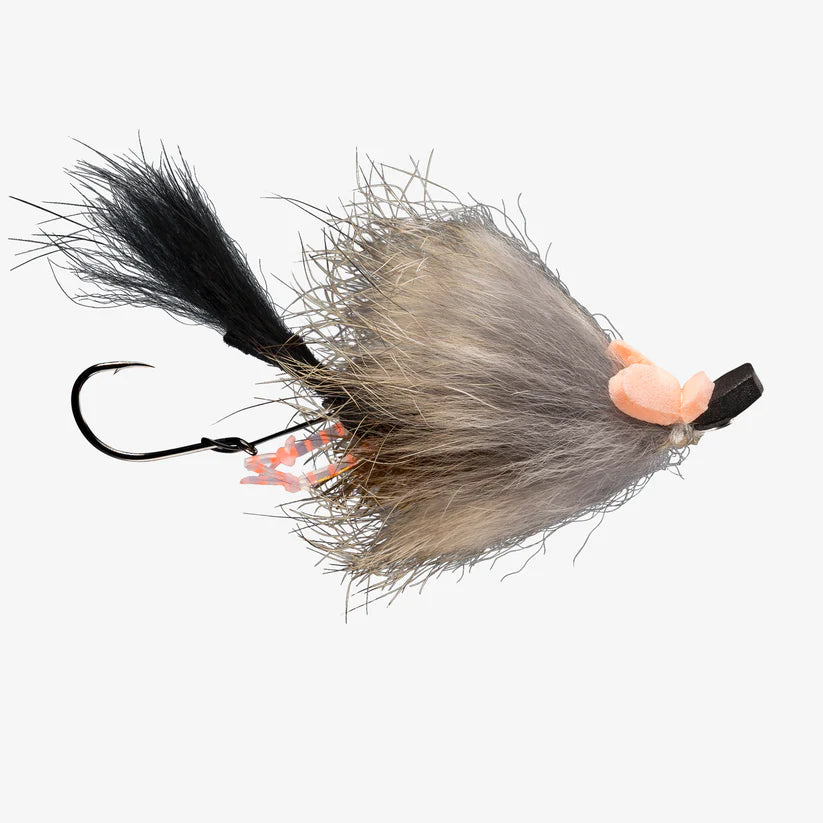 Close-up of RIO's Pip Squeak Mouse fishing lure featuring gray and black fur-like material, a sharp black hook, and orange rubber accents for freshwater fishing tackle.