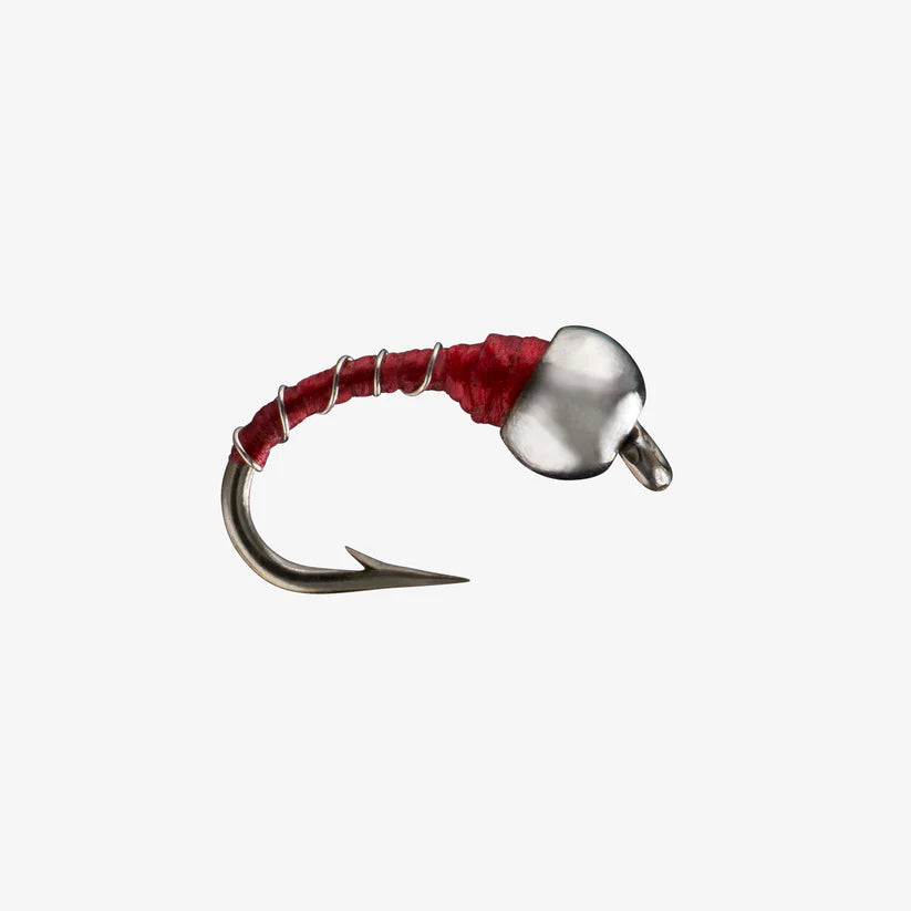 Close-up of a red and silver fishing fly with a tungsten bead head designed for freshwater angling, known as Zebra Midge Tungsten, ideal for fishing tackle enthusiasts.