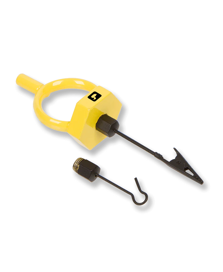 Loon Gator Grip Dubbing Spinner in yellow with a circular handle, a black clip, and two small detachable black components designed for fishing tackle use.