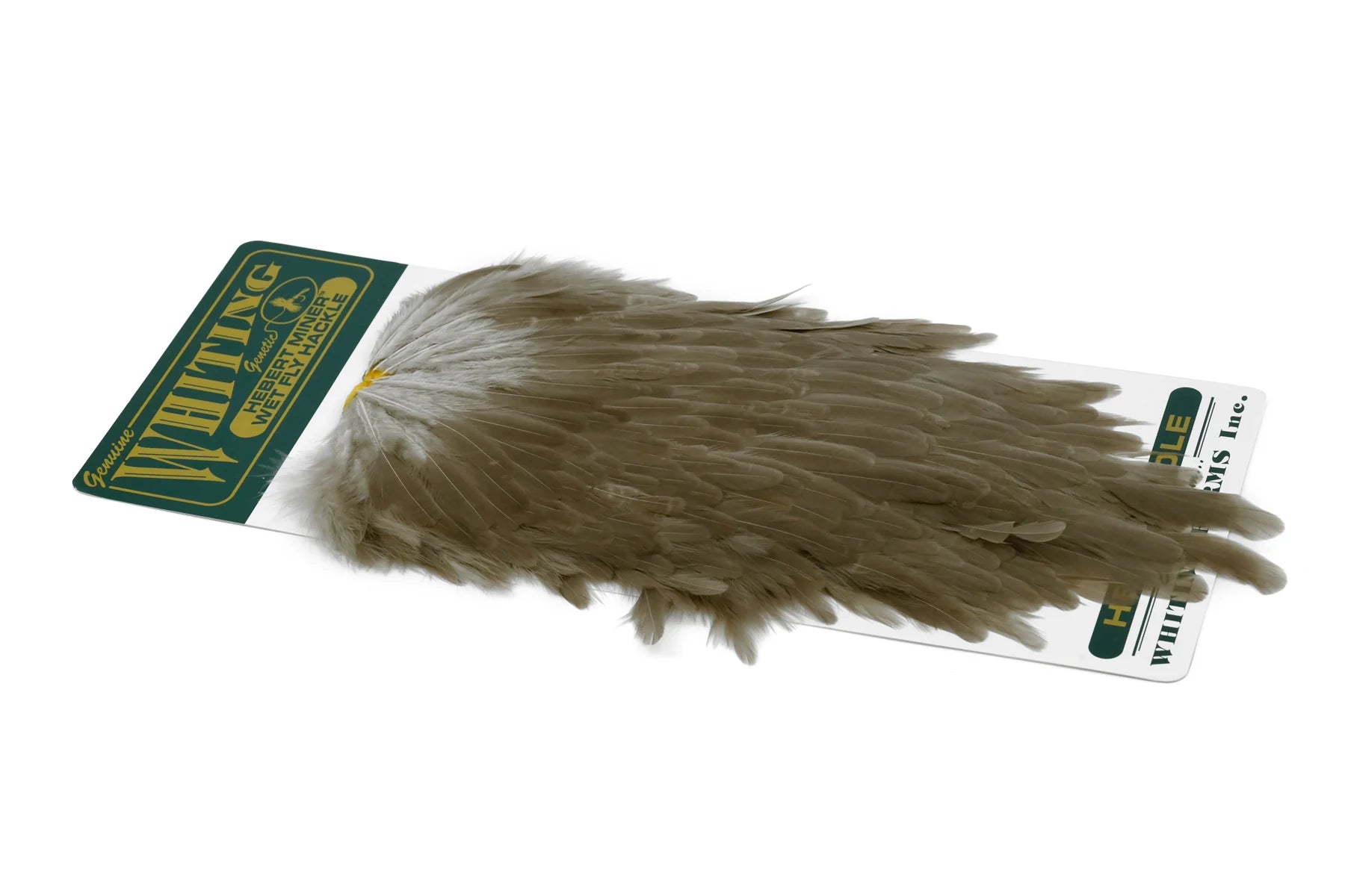 Whiting Hebert Miner Hen Saddle featuring medium brown dun feathers arranged for fly fishing lure tying, ideal for custom fishing tackle craftsmanship.