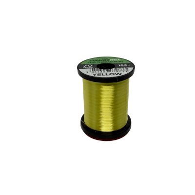 Spool of bright yellow Fulling Mill Pro Thread Flat 70 Den used for fly fishing and custom musky tackle, displayed against a white background.