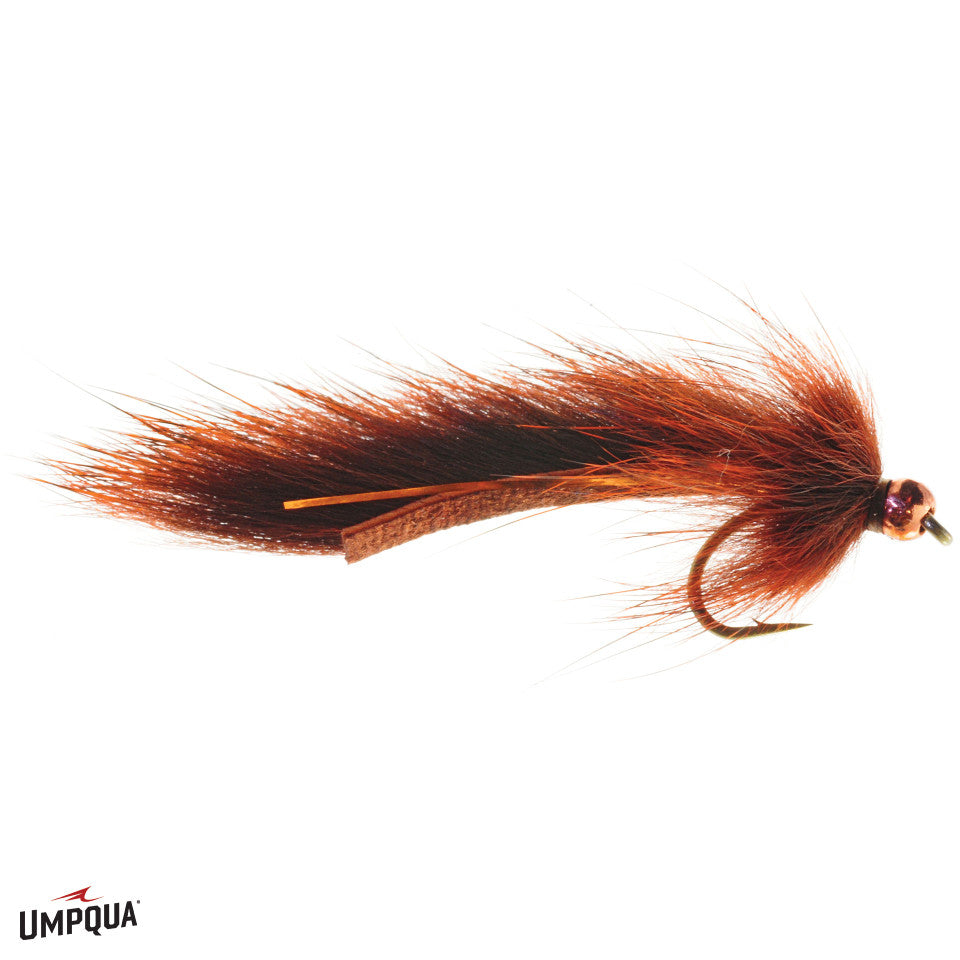 Close-up of a Pine Squirrel Leech #12 fishing lure with brown and reddish fur, designed for fly fishing and musky tackle, featuring a sharp hook and detailed materials.