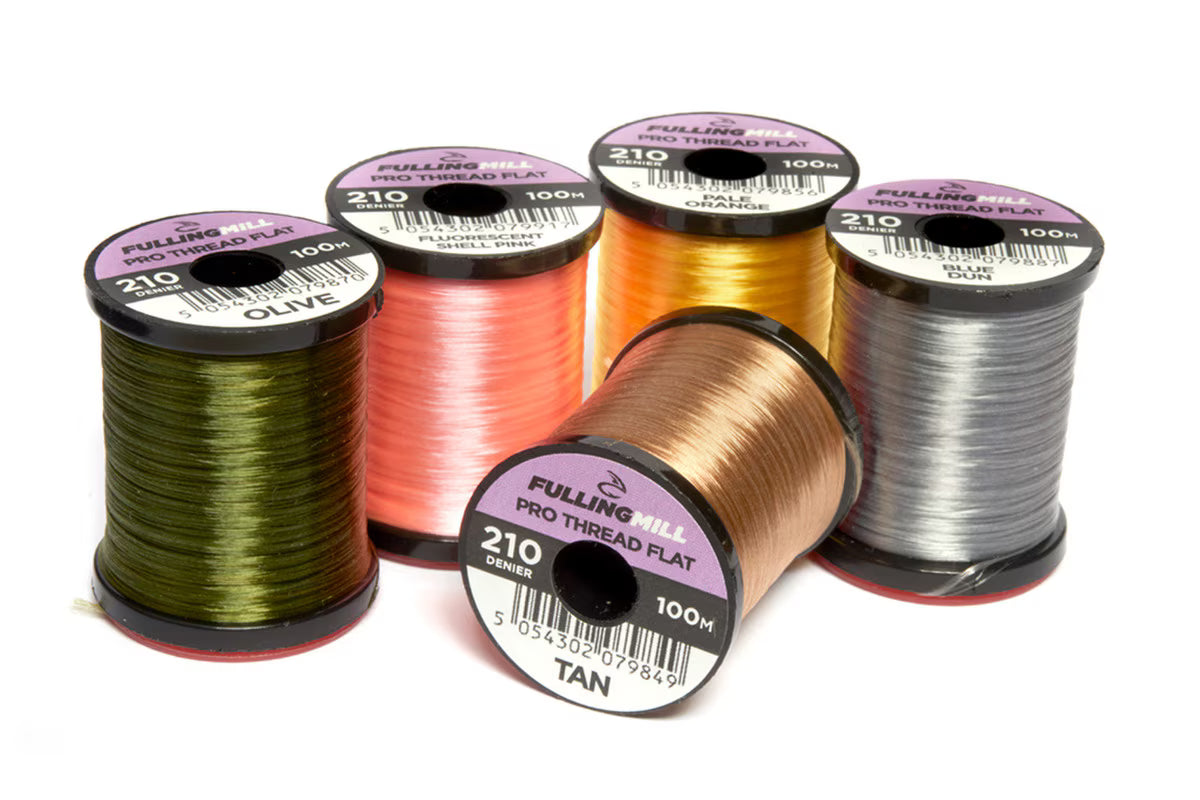 Five spools of Fulling Mill Pro Thread Flat 210 Den fishing thread in various colors including olive, pink, orange, tan, and gray, arranged on a white background.