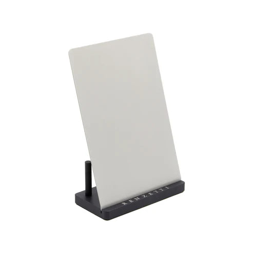 Renzetti Visual Enhancement Plate With Base showing a white rectangular plate standing vertically on a compact black base with branding, designed for fly tying and fishing tackle use.