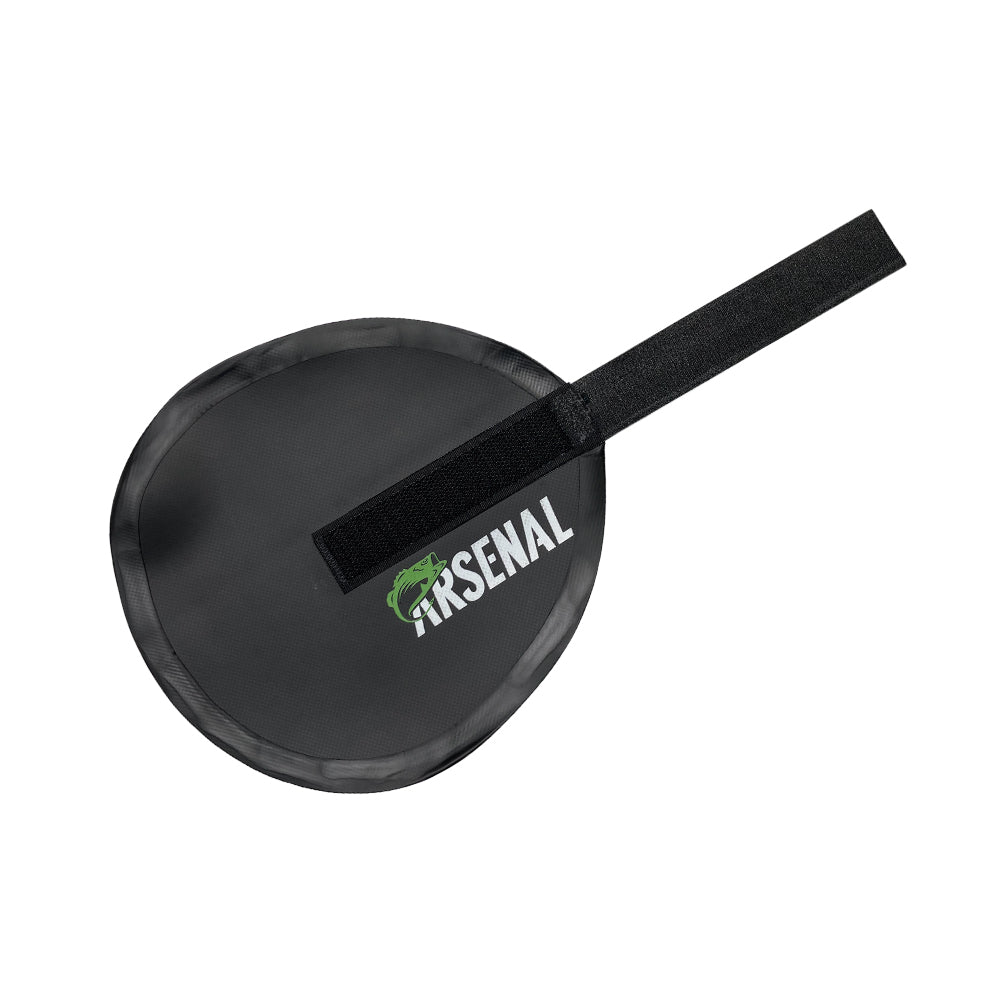 Arsenal Saiko Catchless Lure Wrap in black, featuring a round protective wrap with a secure hook-and-loop strap, designed to safely store fishing lures.