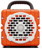 Turtlebox Cub orange portable Bluetooth speaker with rugged carry handle and front grille for outdoor listening and fishing adventures