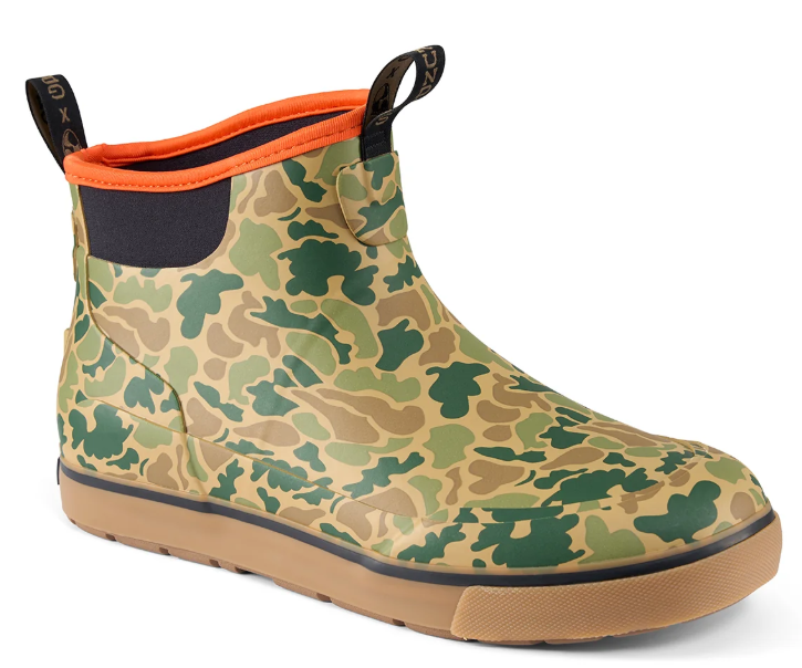 Grundens Deck-Boss Boot in green camouflage with orange lining black pull tabs and tan rubber sole for fishing and outdoor use