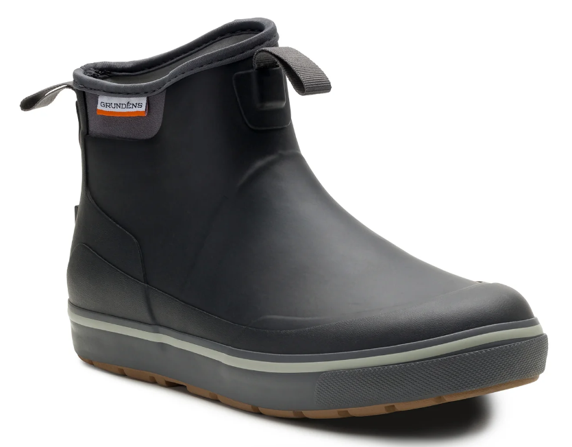Grundens Deck-Boss Boot in black with a waterproof rubber upper rugged sole padded collar and adjustable pull tabs for fishing and outdoor use