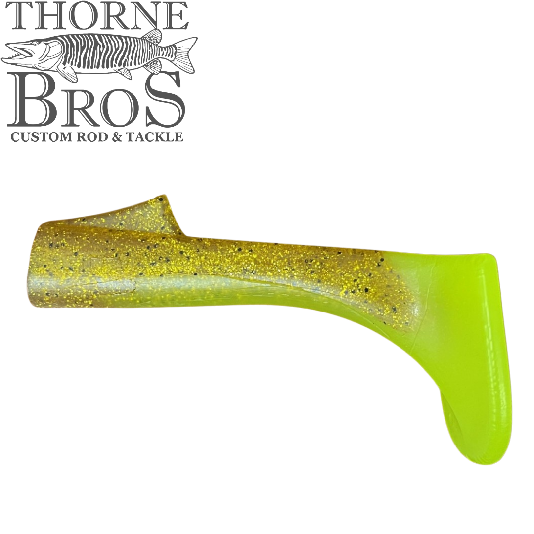 Zilla Baits Replacement Tails (1 Pack) shown in yellow-green with glitter, designed as soft fishing lure tails for enhancing fishing tackle and lure effectiveness.