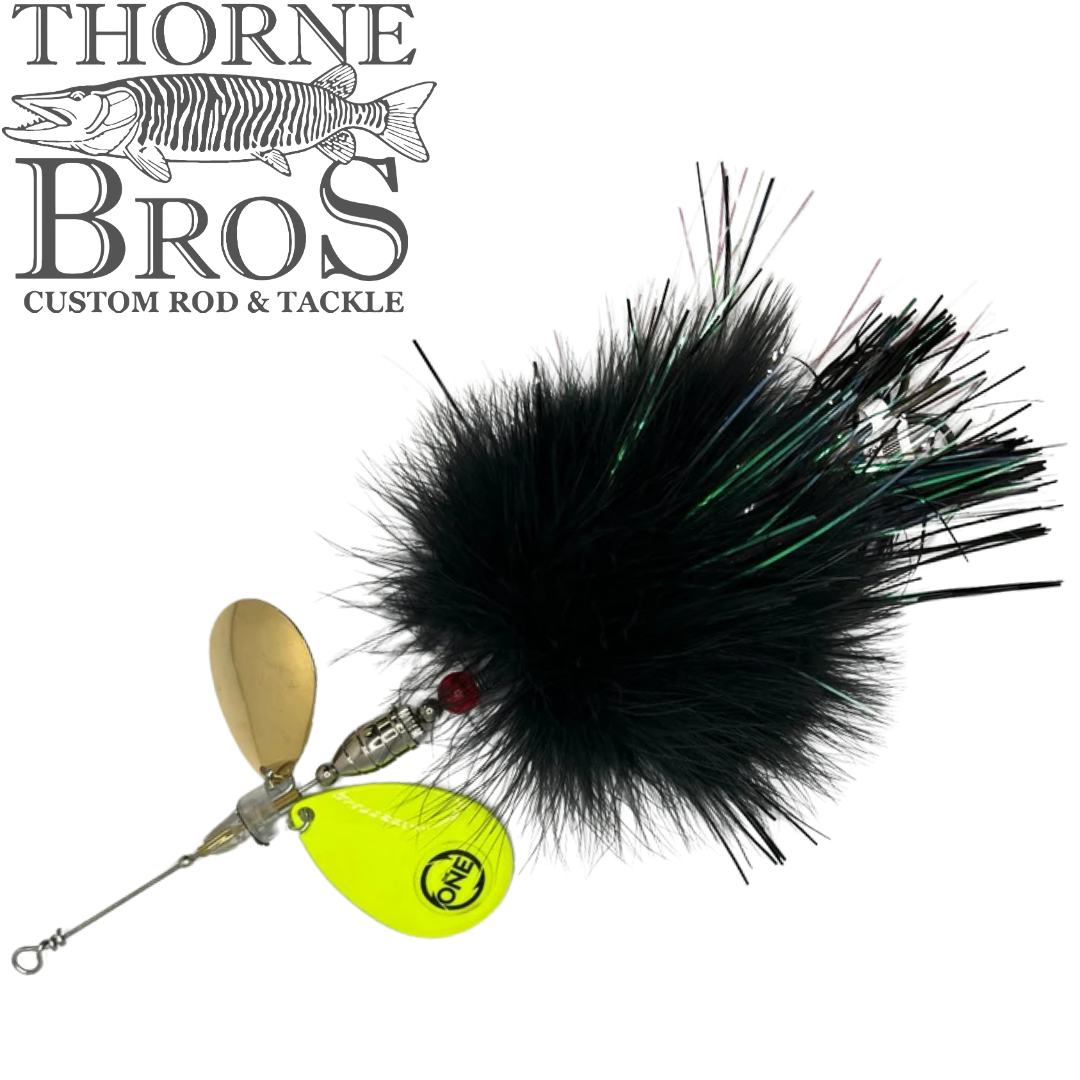 Angling Revolution "The Little One" musky fishing lure with black bucktail skirt chartreuse spinner blade and red bead on a white background