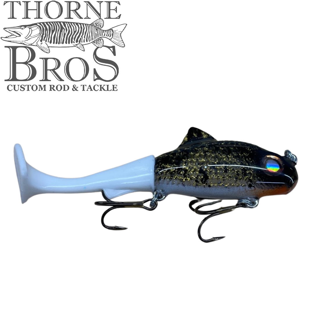 Zilla Baits TicTak musky fishing lure with a black and blue fish body pale blue tail and two treble hooks for fishing tackle
