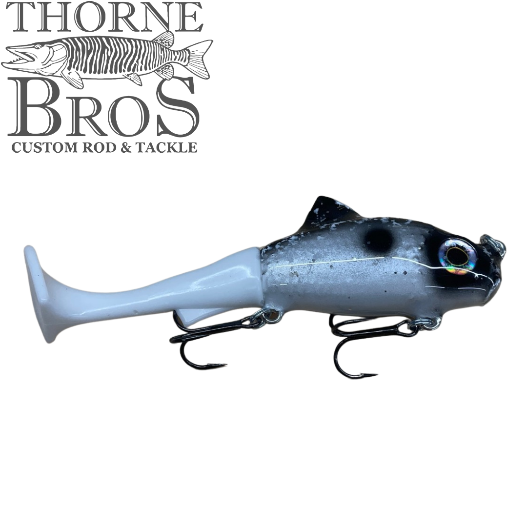 Zilla Baits TicTak gray fish shaped fishing lure with paddle tail and treble hooks for musky fishing tackle