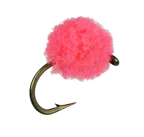 Close-up of a bright pink Egg Fly fishing lure with a fluffy textured spherical head attached to a sharp metal hook, designed for fly fishing and fishing tackle use.