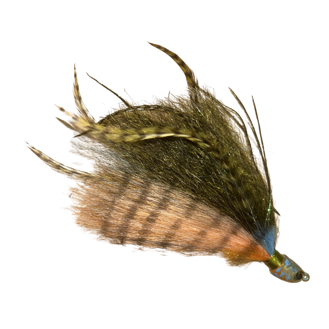 Close-up of a Dude Hair Jigs fishing lure featuring detailed olive and tan synthetic hair with striped feather accents, designed for musky fishing tackle.