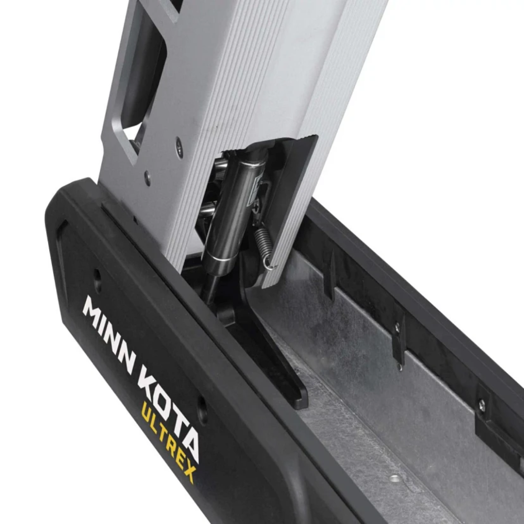 Close-up view of the Minn Kota Ultrex 80/52" trolling motor showing the black and silver mechanical components and mounting area designed for marine electronics and fishing tackle use.