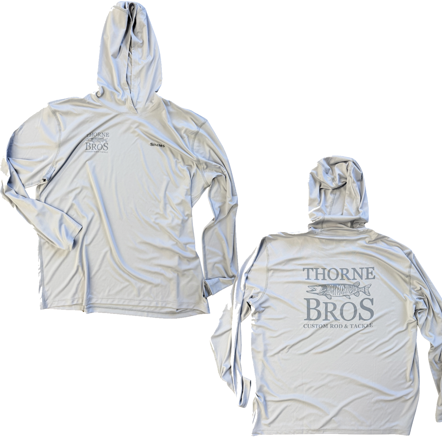Simms Thorne Bros. Logo M's SolarFlex Hoody shown front and back, light-colored long-sleeve hooded shirt with Thorne Bros fishing tackle branding and graphic of a fish on the back.
