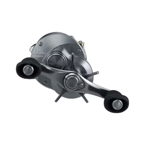Close-up view of a sleek, metallic Shimano Calcutta Conquest DC 200 fishing reel featuring dual black ergonomic handles, designed for precision and smooth operation in fishing tackle.
