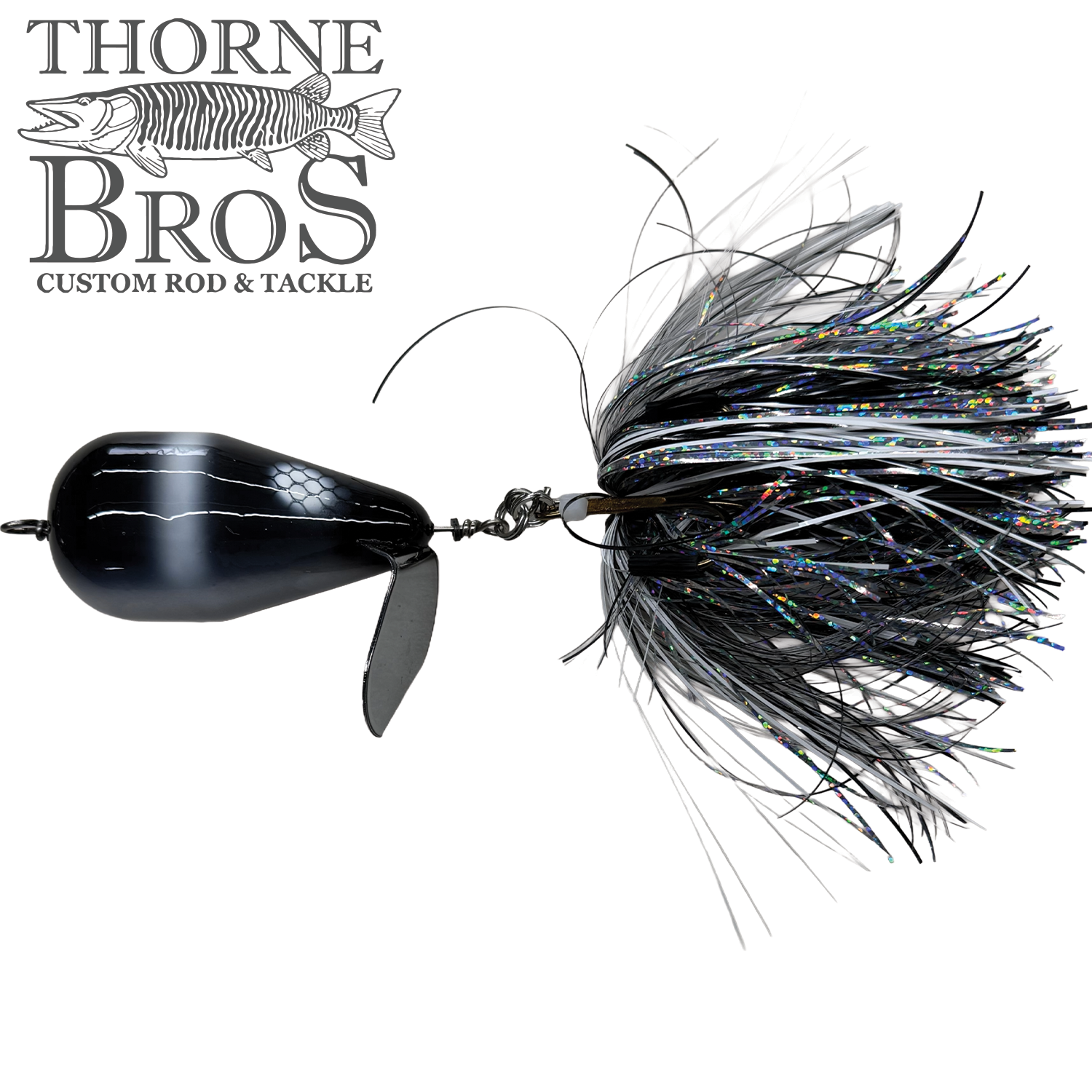 Spanky Baits Violence fishing lure with a black body, a shiny reflective skirt of black and silver strands, designed for musky fishing, shown against a white background.