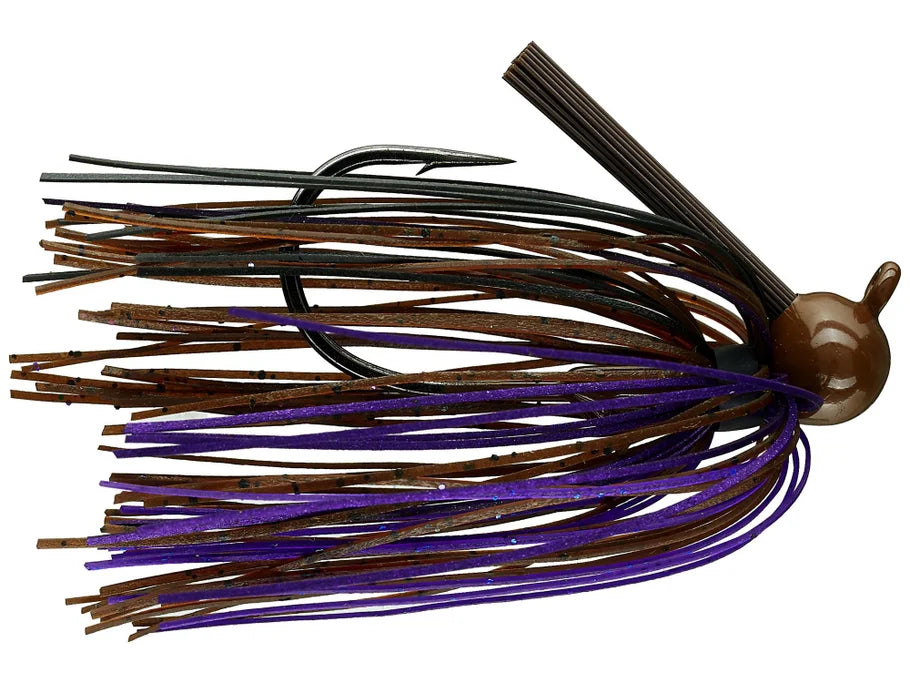 Dirty Jigs Weekender Football Jig featuring a brown and purple skirt with a weighted football-shaped head and a sharp fishing hook, designed for effective fishing tackle use.