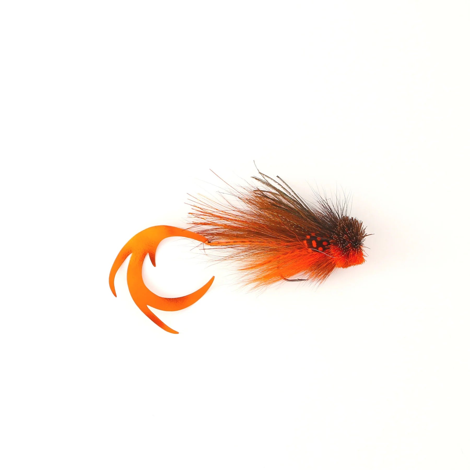 Single Buford Dragon Tail Urban Fly Co. fishing lure featuring an orange curved tail and a fluffy body with black and orange feathers designed for fly fishing.