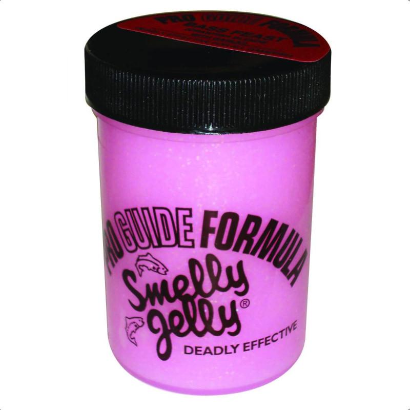 Container of bright pink Smelly Jelly ProGuide Formula fishing scent with black screw-on lid, designed to attract fish and enhance fishing tackle effectiveness.