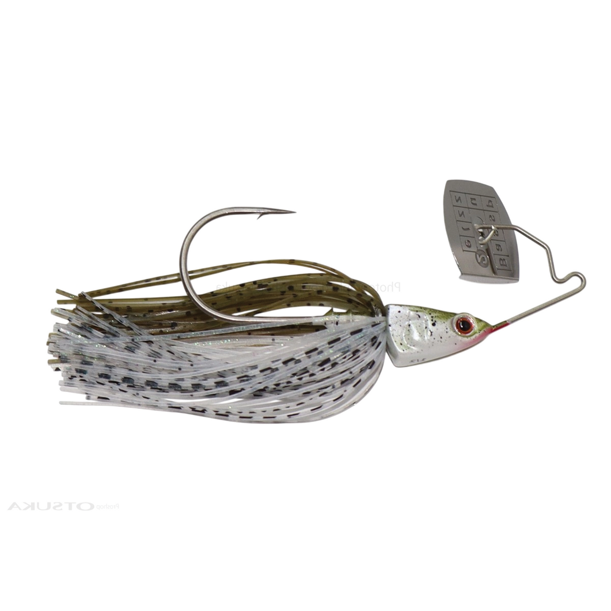 Bass Puzzle Grass Piece fishing lure with a gray speckled skirt red eye single hook and metal blade designed for bass fishing