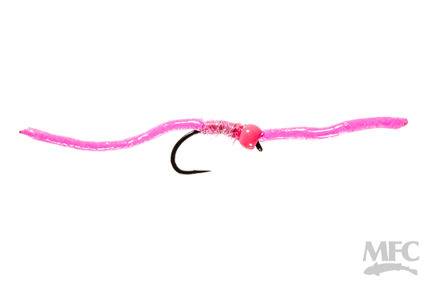 Trina's Squirm #10 fishing lure in bright pink with a soft, flexible body and a single black hook, designed for musky and ice fishing tackle.