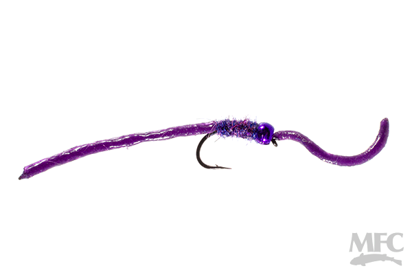 Trina's Squirm #10 is a purple fishing lure with a slim, segmented body and a curved tail, designed for fly fishing and fishing tackle.