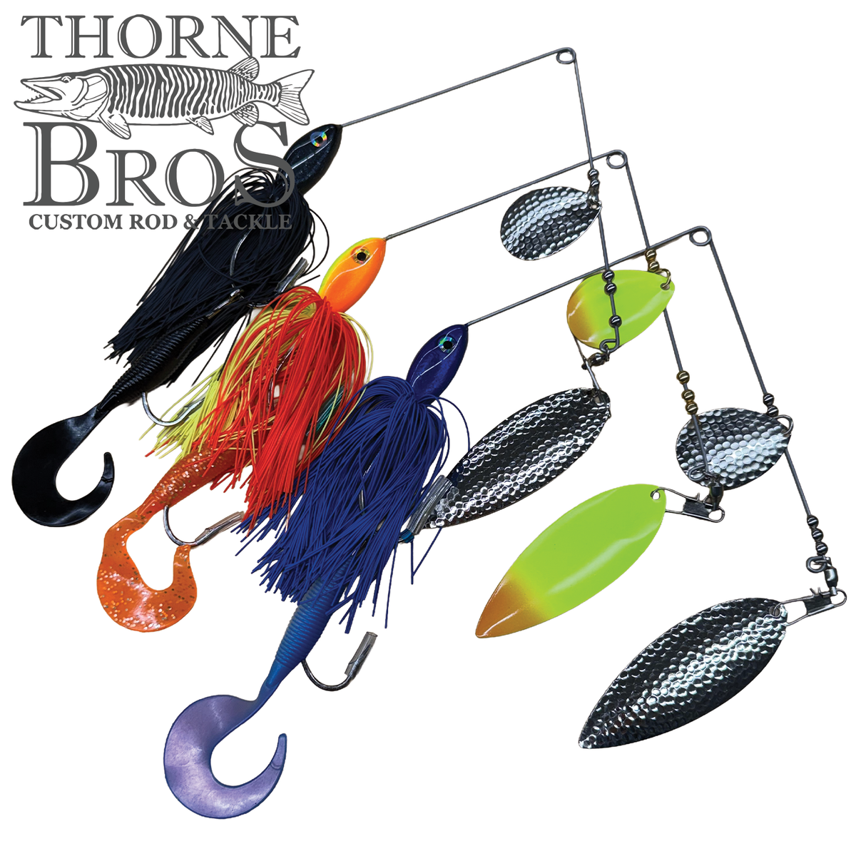 Ace Baits Monster Spinnerbait assortment featuring black red and blue skirted lures with colorful blades oversized hooks and textured metal spinner blades