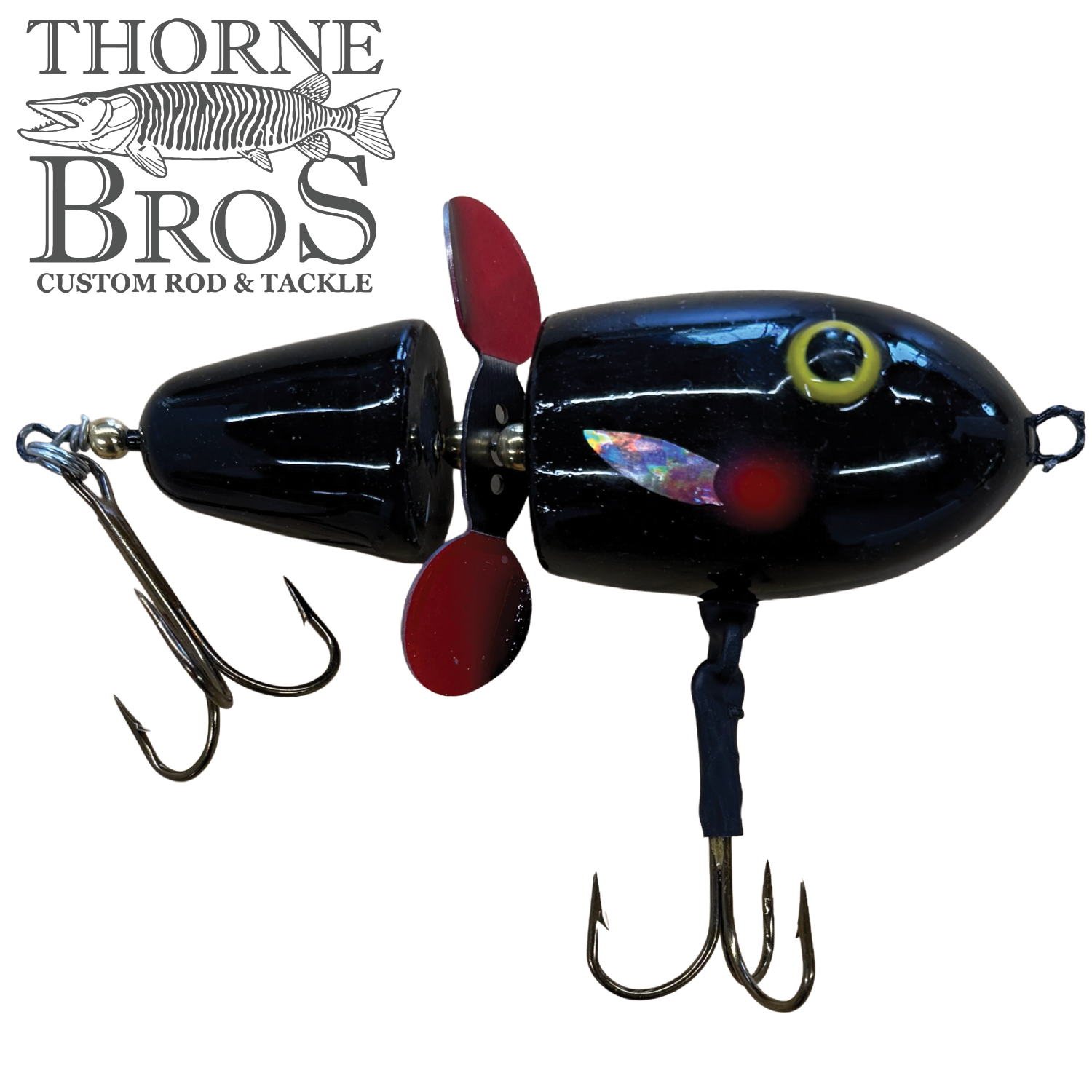 Lake-X Hammer fishing lure in black with red propeller blades, realistic eye detail, and sharp treble hooks designed for musky fishing.