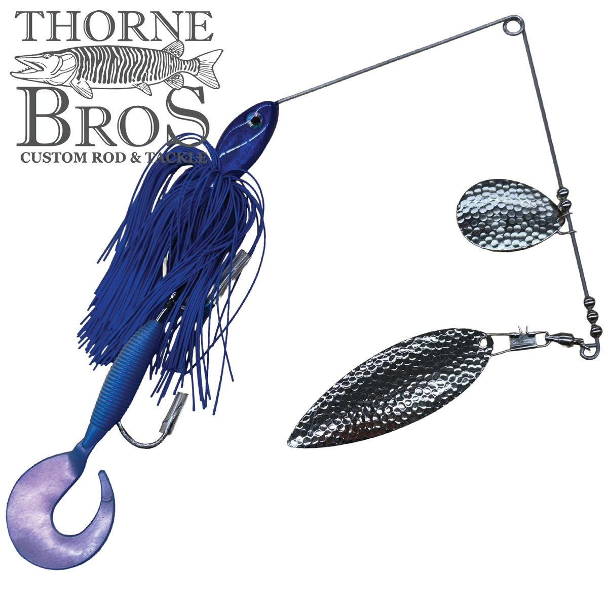 Ace Baits Monster Spinnerbait blue musky fishing lure with a rubber skirt two hammered silver blades and a purple curly tail for fishing tackle