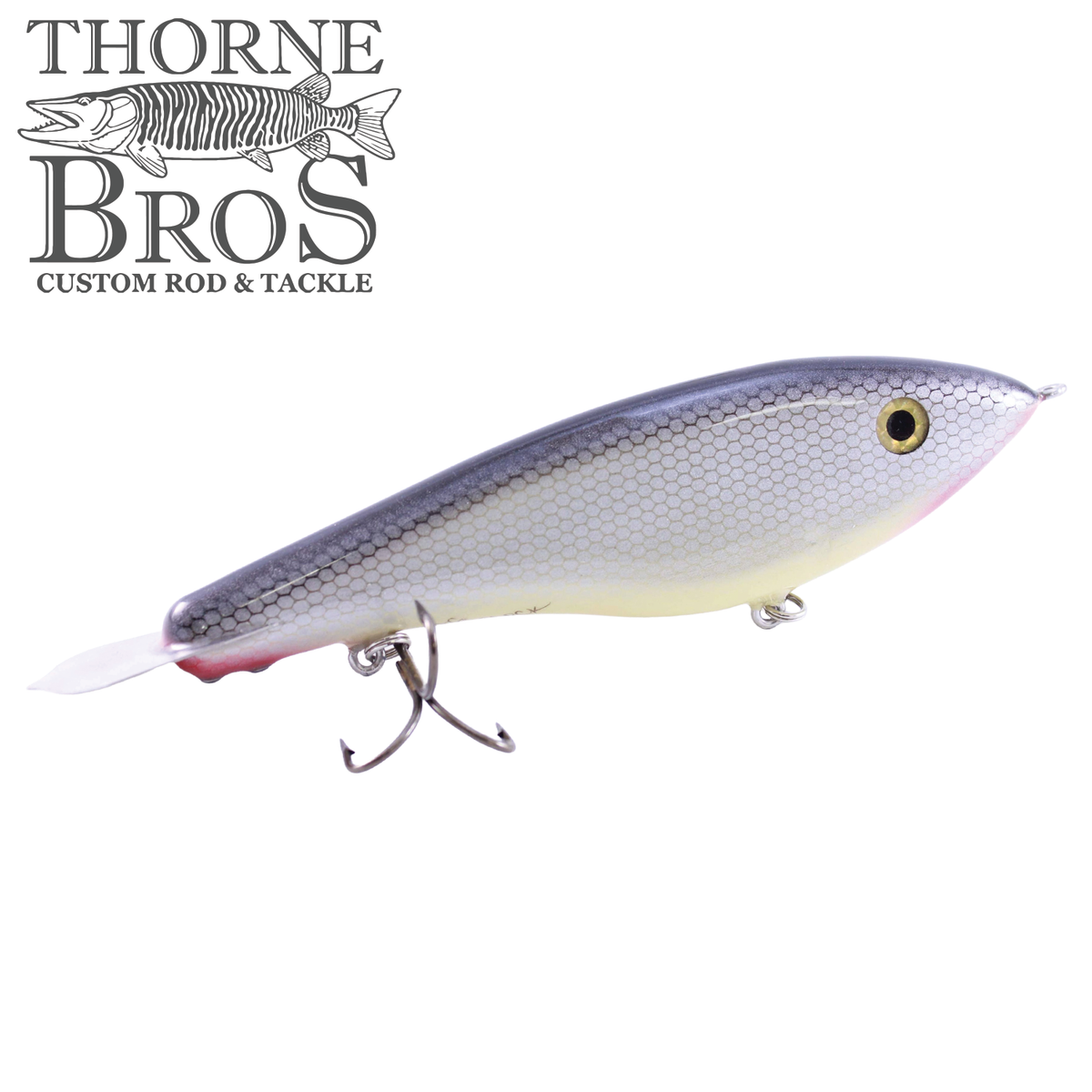 Bitten Warlock - REG. fishing lure from Thorne Bros with a lifelike fish profile purple back silver scales pink belly and treble hooks