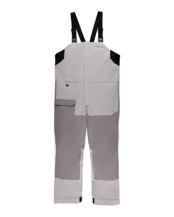 Simms Men's Challenger Rain Bib in light and dark gray tones with adjustable black shoulder straps, designed for durable waterproof protection during fishing activities.